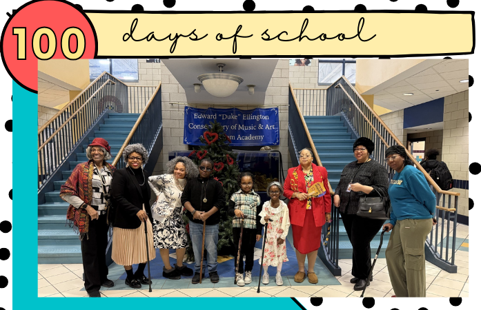 Staff and student celebrating the 100th day of school